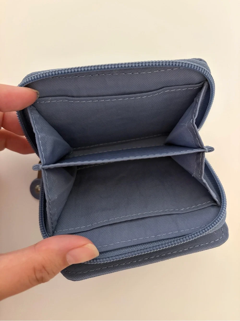Kipling Zip/button Card Wallet in a purple/Blue